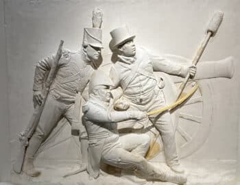 A sculpture of a group of men.